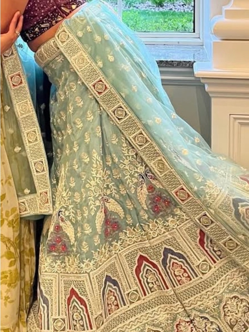 Embroidered Pastel Blue Lehenga with Multicolor Accents